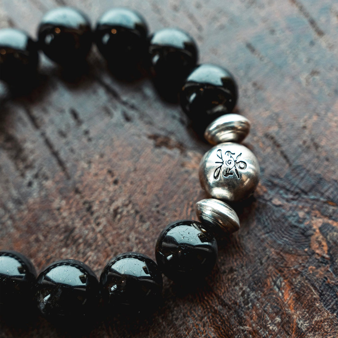 Variety of energy bracelet styles featuring vibrant crystals.